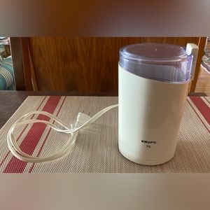 Krup 75 Coffee Bean Grinder, used but in like-new condition. White/beige color.